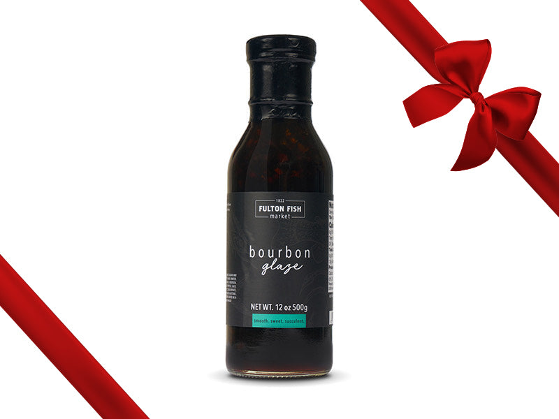 Fulton Fish Market Sweet Bourbon Seafood Glaze Bottle on White Background with Gift Bow Graphic on Top Right