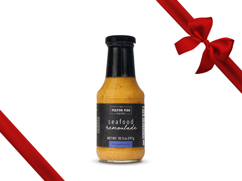 Fulton Fish Market Seafood Remoulade Sauce Bottle on White Backgound with Gift Bow Graphic on Top Right