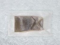 Back of Wild Black Cod (Sablefish) Portion In Package on Ice