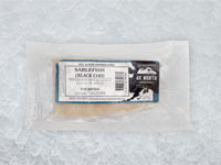 Front of Wild Black Cod (Sablefish) Portion In Package on Ice