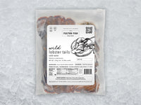 Jumbo Cold Water Wild Lobster Tails front of package on ice