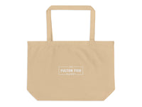 Beige tote bag with 'Fulton Fish Market' logo on a white background