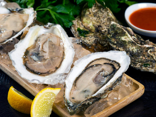 Shucked Duxbury XL Oysters with Lemon and Herbs