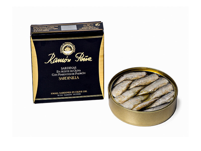 Ramón Peña Gold Sardines in Olive Oil with Padron Peppers Open Can with Box on White Background