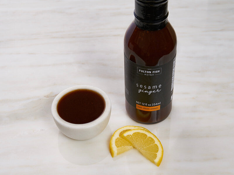 Fulton Fish Market Sesame Ginger Marinade in Small Bowl with Lemons