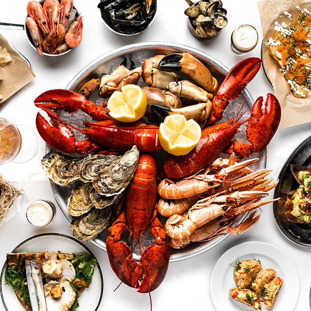 Assortment of Prepared Seafood on Plates