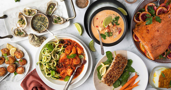 Assortment of Cooked Seafood on White Table