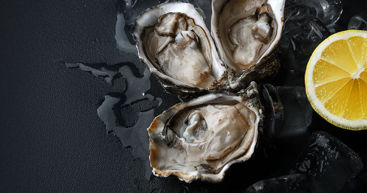 Shucked Oysters on Ice with Lemon