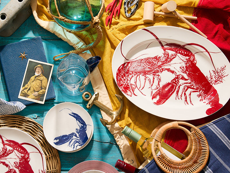 Red Lobsters Oval Rimmed Platter on Table Spread with Wine