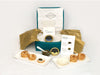 Imported Caviar Assortment Bundle items with cavair, blinis and creme fraiche