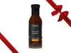 Fulton Fish Market Sesame Ginger Marinade Bottle on White Background with Gift Bow Graphic on Top Right