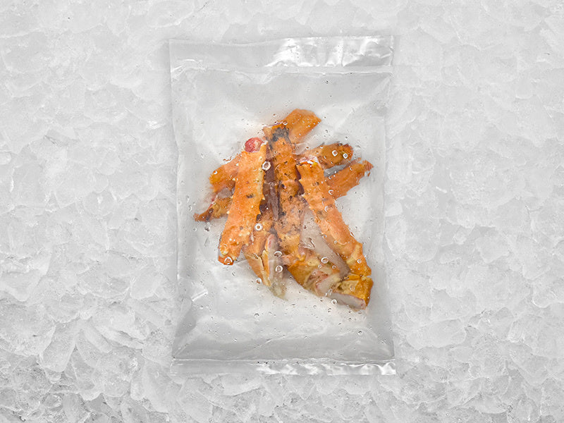 Wild Golden King Crab center cut legs in package on ice