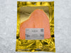 Signature Smoked Salmon front of package on ice