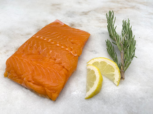 Arctic Char Portion on Marble with Lemon and Herb