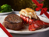 Prepared Surf & Turf Dinner of Steak and Lobster Tails with Gift Bow Graphic on Top Right