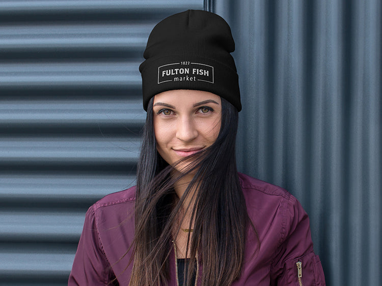 Black Beanie with Fulton Fish Market Logo on woman