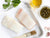 Atlantic Halibut Portions on Baking Sheet with Olive Oil, Capers, Garlic, and Parsley