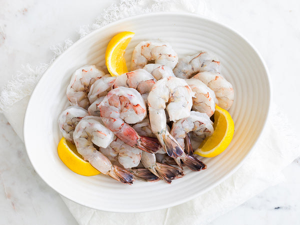 Peeled & Deveined Wild Blue Shrimp on Platter with Lemon Wedges