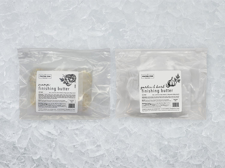 Fulton Fish Market Finishing Butter Bundle front of packages on ice