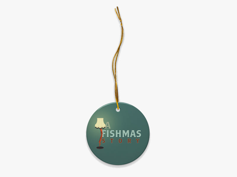 A Fishmas Story Blue Ornament with Gold String on White Background