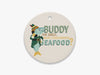 Close Up of Buddy the Smelt Beige Ornament on White Background