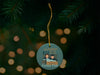 No, It's Fulton Fish Blue Ornament with Christmas Tree Background