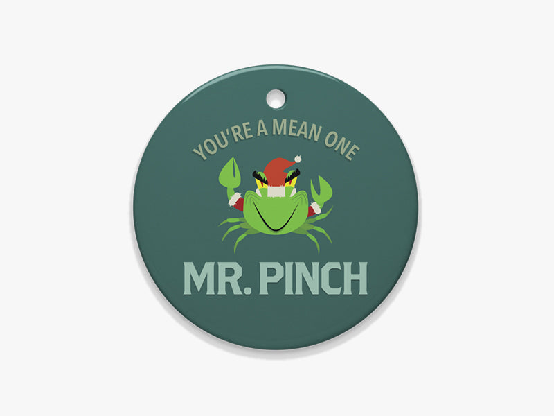 Close Up of Mr. Pinch Blue Ornament on White Background