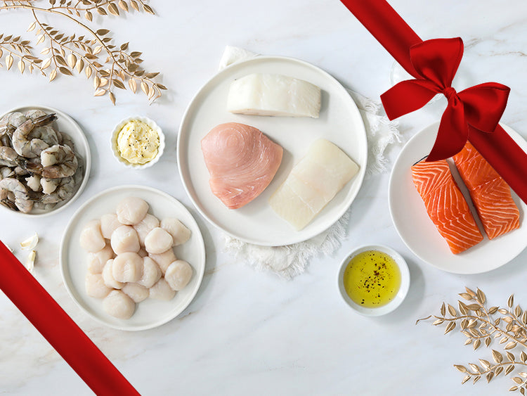 Salmon, Swordfish, Chilean Sea Bass, Halibut, Shrimp, and Scallops on Plates on White Festive Background wtih Gift Ribbon