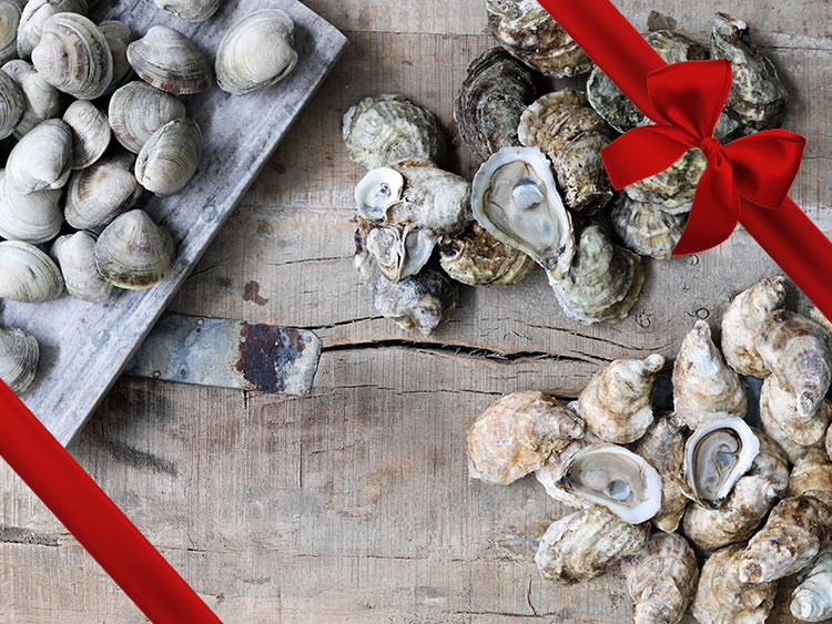 Countneck Clams, Blue Point Oysters, and Pink Moon Oysters on Wood Surface with Gift Ribbon