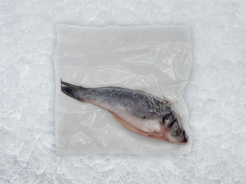 Butterflied Branzino Back of Package on Ice
