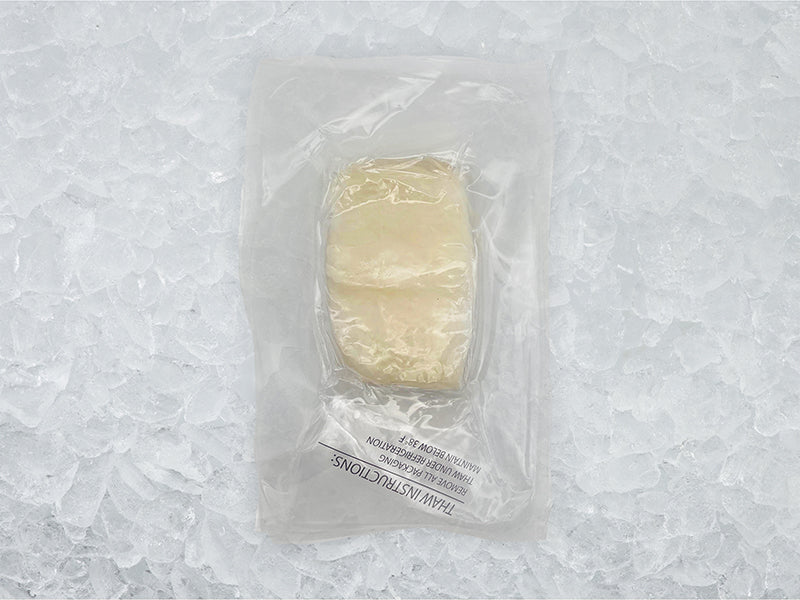 Chilean Sea Bass Portion Front of  Package on Ice