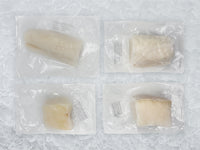 Chilean Sea Bass Portions In Package on Ice Showing Variance in Shape