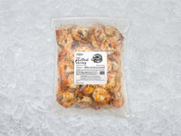 Grilled Shrimp Front of Package on Ice