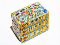 Three stacked Fishwife Sardines with Hot Peppers boxes on White Background