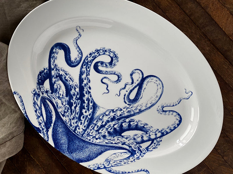 Lucy the Octopus Rimmed Oval Platter on Wood Table