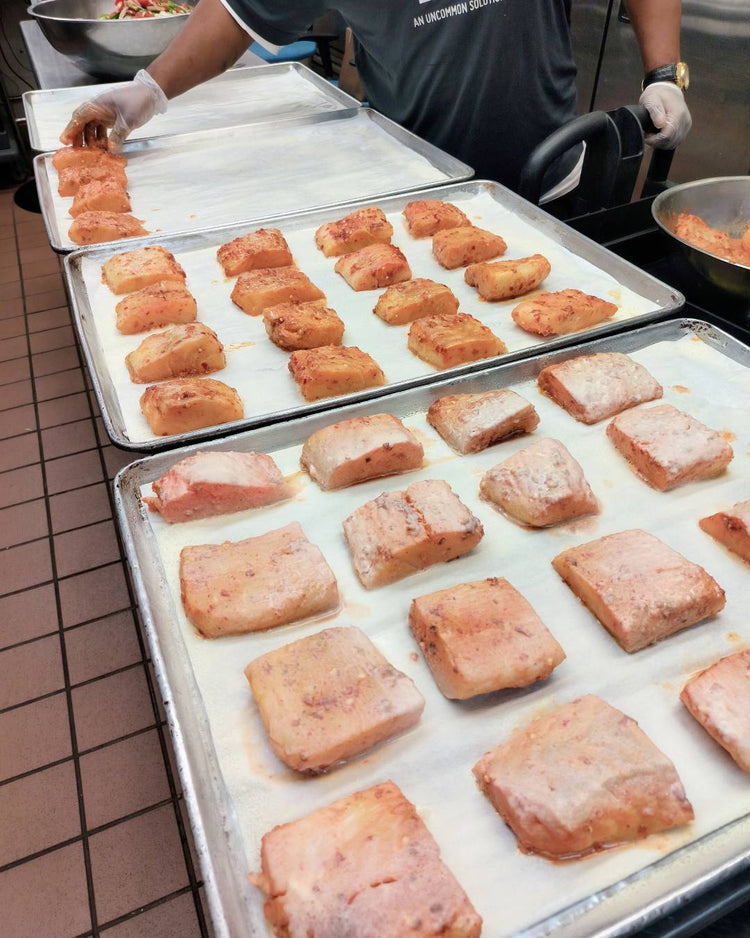 NY Common Pantry Preparing Seafood on Sheet Pans with Seafood Donated by Fulton Fish Market