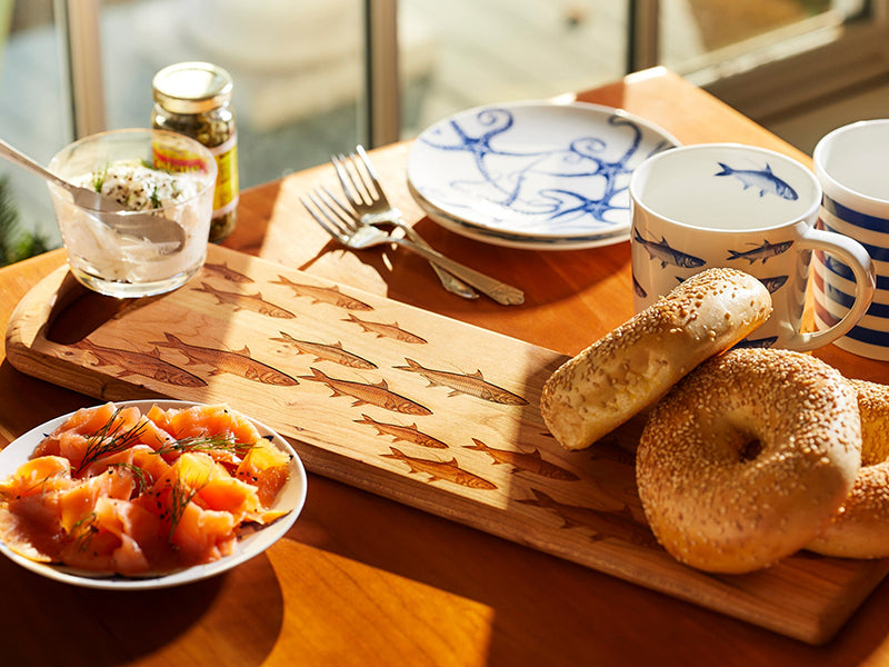 School of Fish Serving Board with Spread of Bagels and Lox