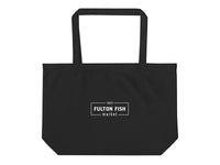 Black tote bag with 'Fulton Fish Market' logo on a white background