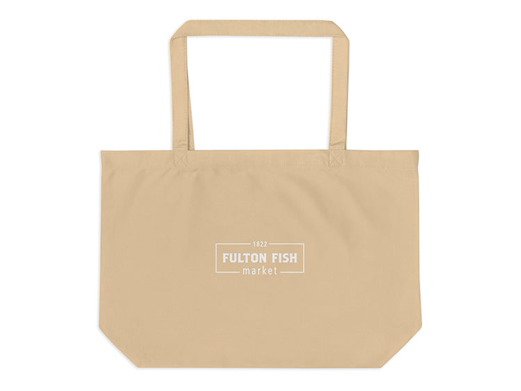 Beige tote bag with 'Fulton Fish Market' logo on a white background