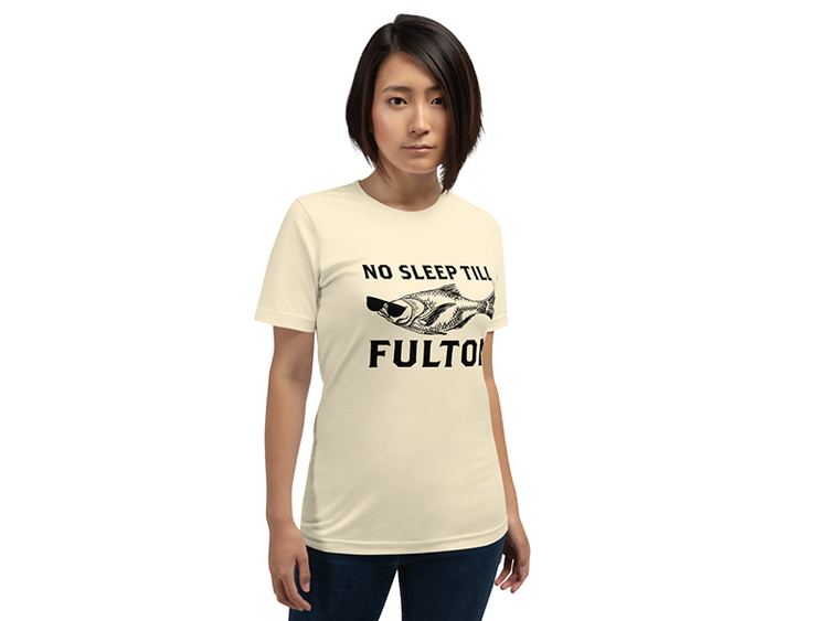 Front of Beige "No Sleep Till Fulton" T-Shirt with a fish with sunglasses on woman