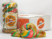 Rainbow Bagels in Front of Packaged Bagels and Shipping Box