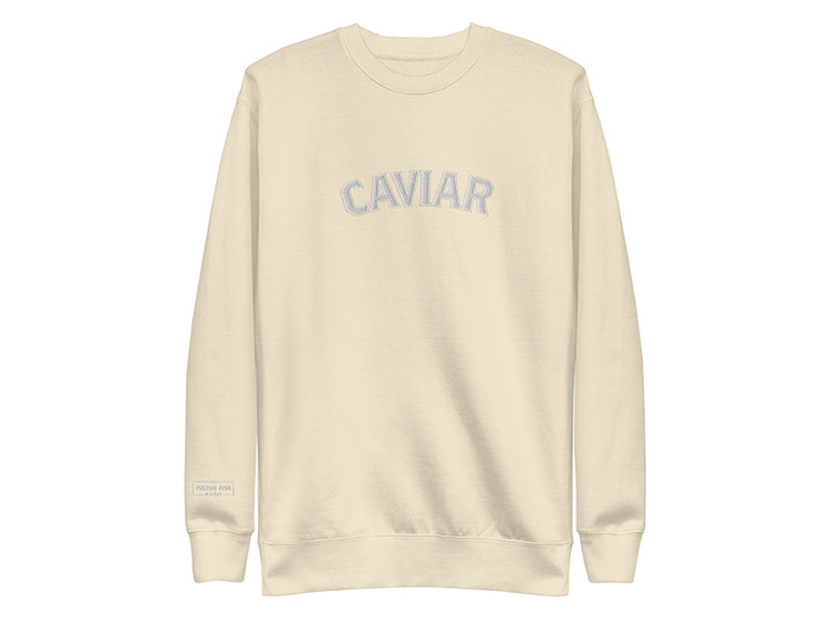 Beige sweatshirt with 'SCALLOPS' text on a white background