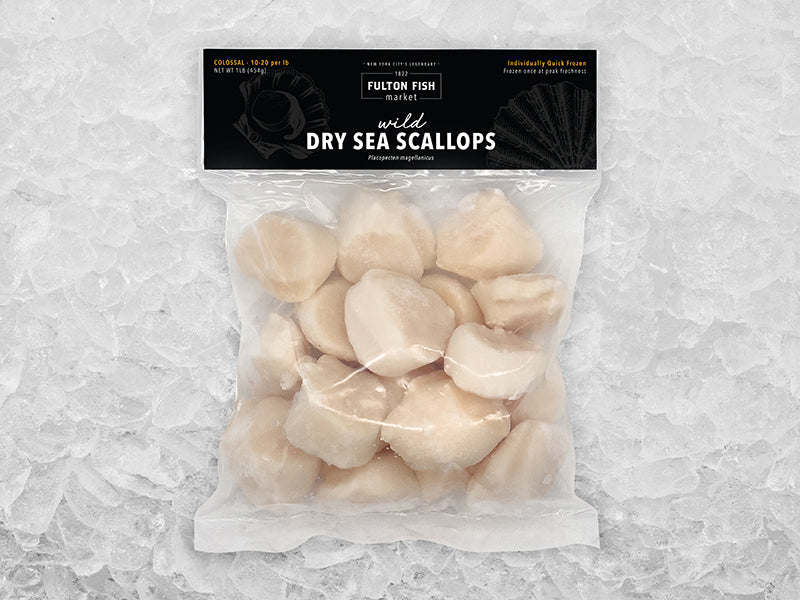 Wild Dry Sea Scallops Front of Package on Ice 